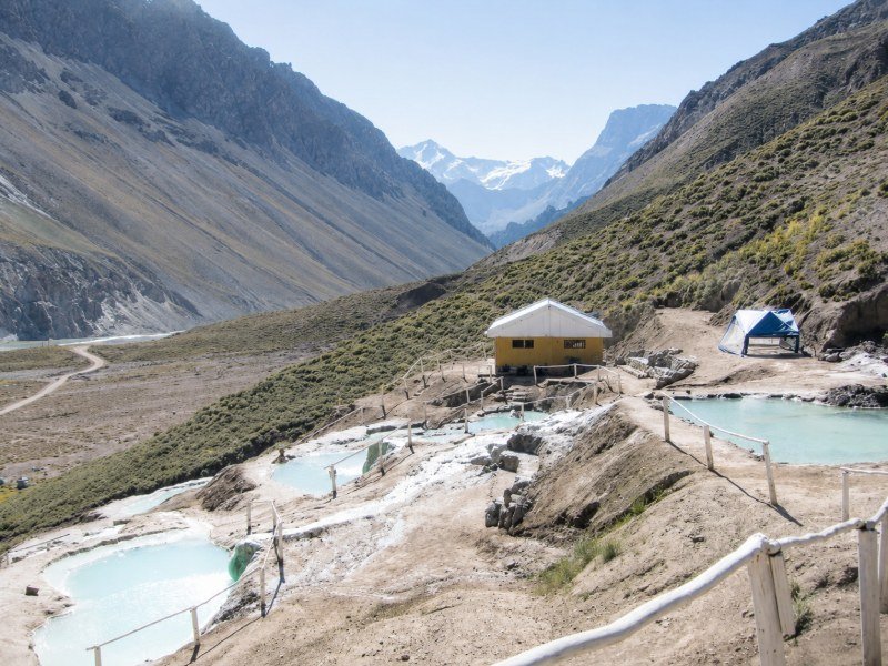 High Andes valley in the upper Cajón del Maipo, with snow-capped peaks at the head of the valley